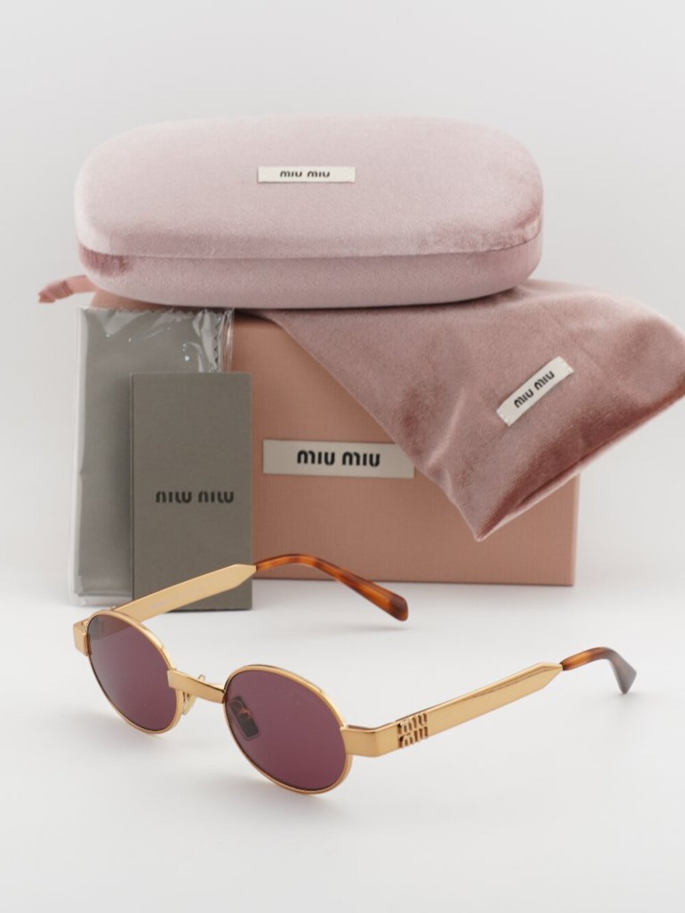 Miu Miu MUB51S 7OE30Y Oval Sunglasses – Brass\ Dark Violet